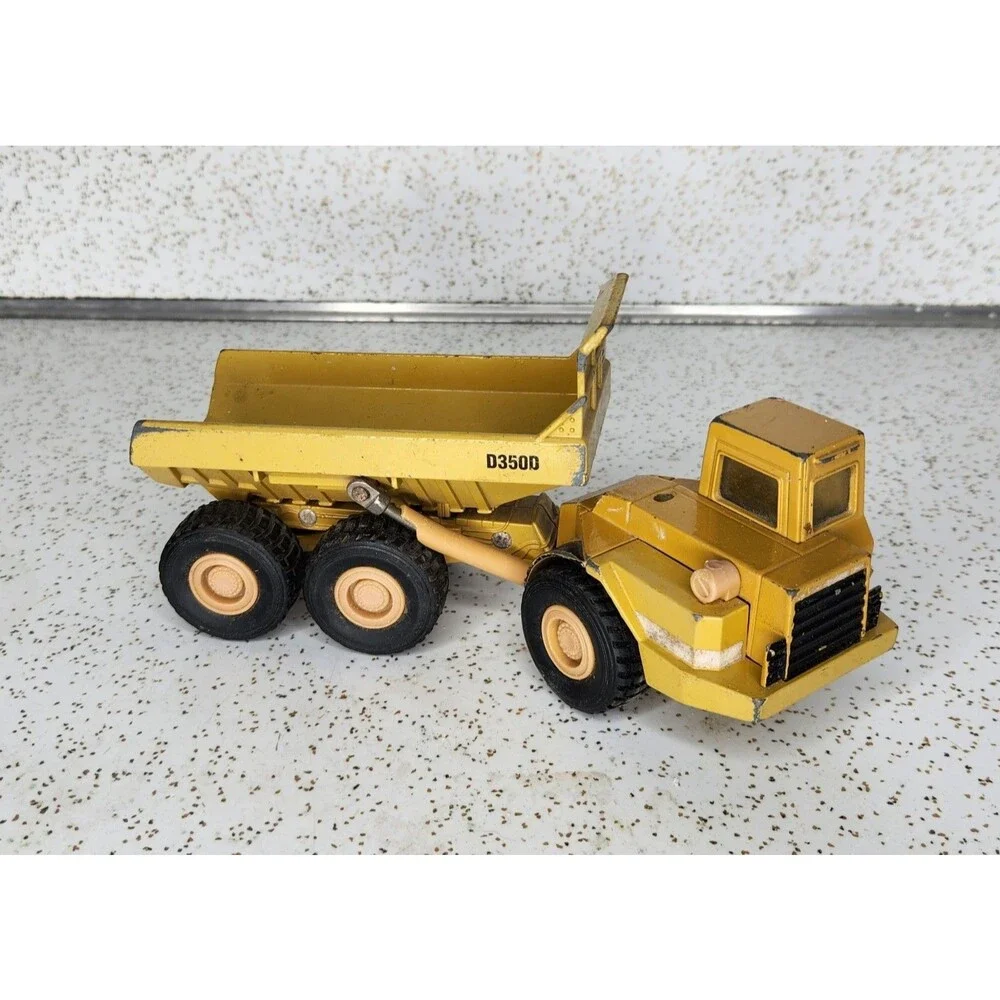 Ertl Mighty Movers 2431 1:50 Caterpillar D350D Articulated Dump Truck Die-Cast
